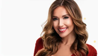Portrait Of A Smiling Woman With Wavy Brown Hair