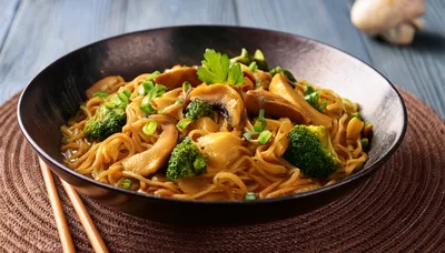 Bowl Of Stir Fried Noodles With Vegetables