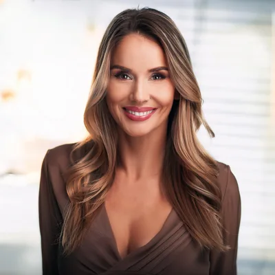 Professional Portrait Of A Smiling Woman In Brown Dress
