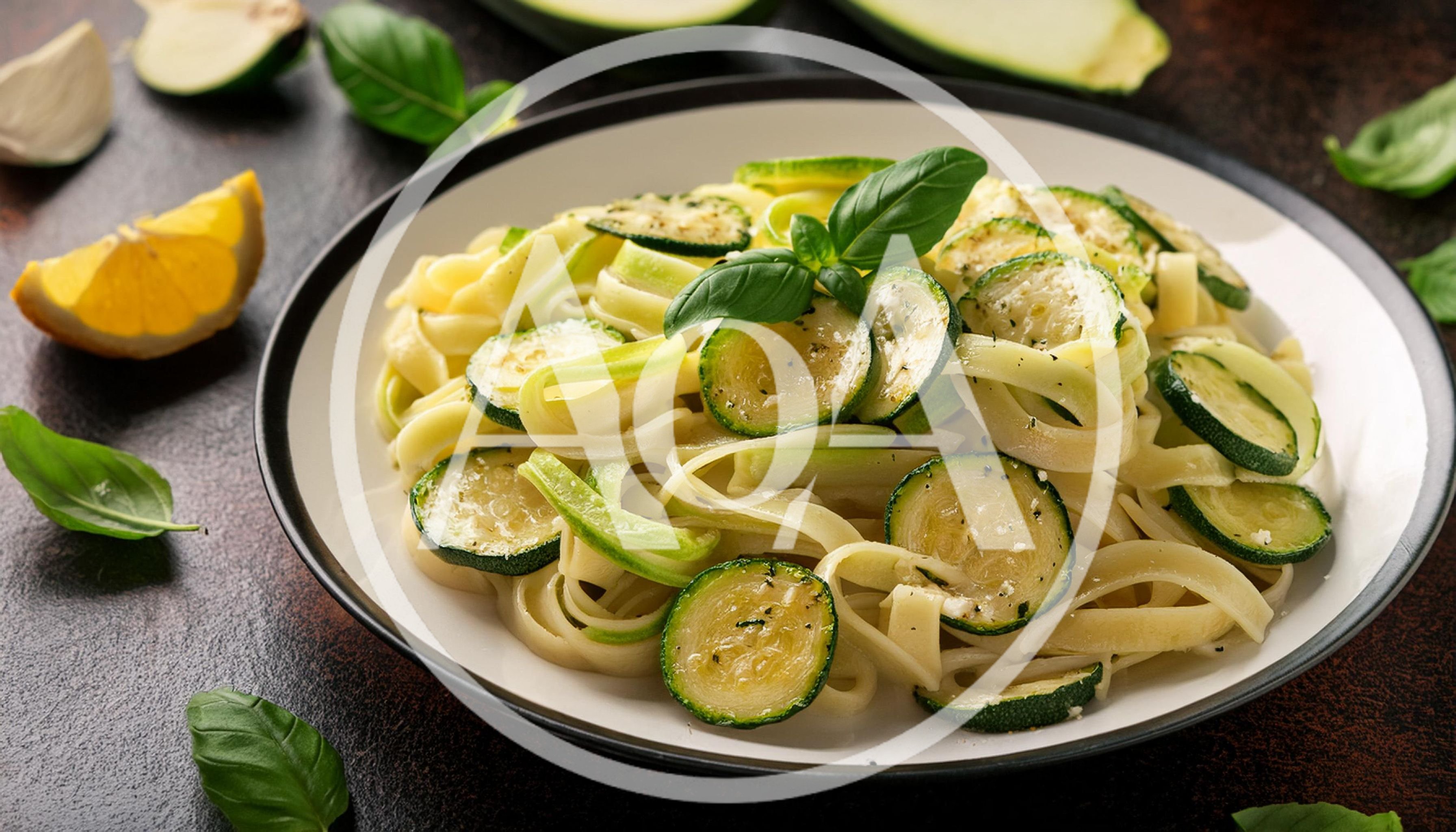 Zucchini Pasta Dish With Fresh Basil Garnish
