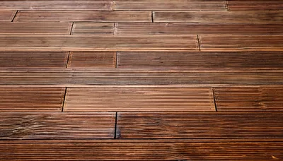 Brown Wooden Decking Planks With Grooved Texture