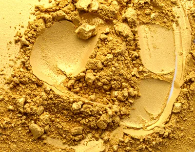 Gold Cosmetic Powder Texture Background
