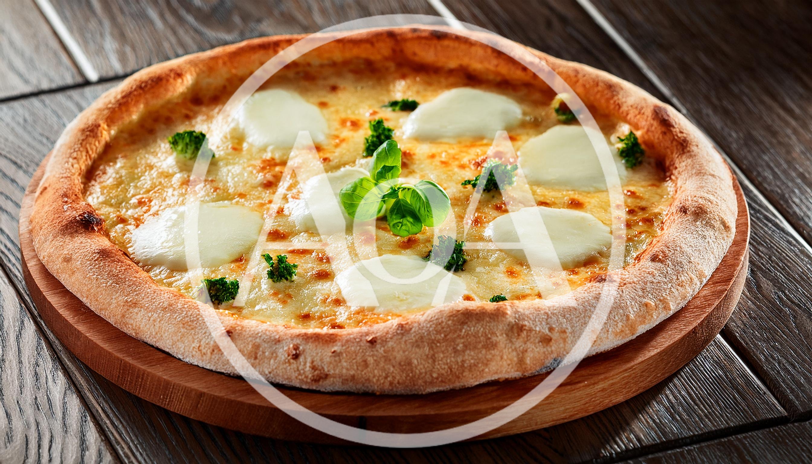 Freshly Baked Margherita Pizza On A Wooden Board
