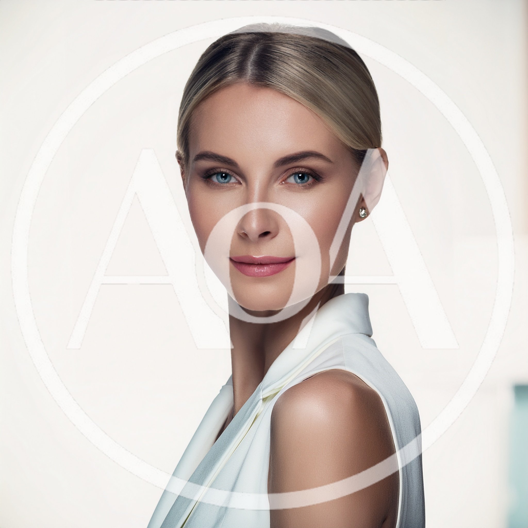 Portrait Of A Beautiful Blonde Woman In White