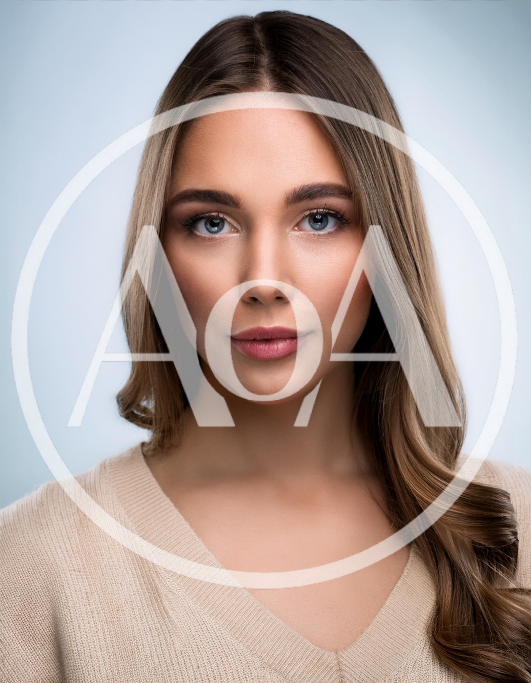 Portrait Of A Beautiful Young Woman With Long Hair