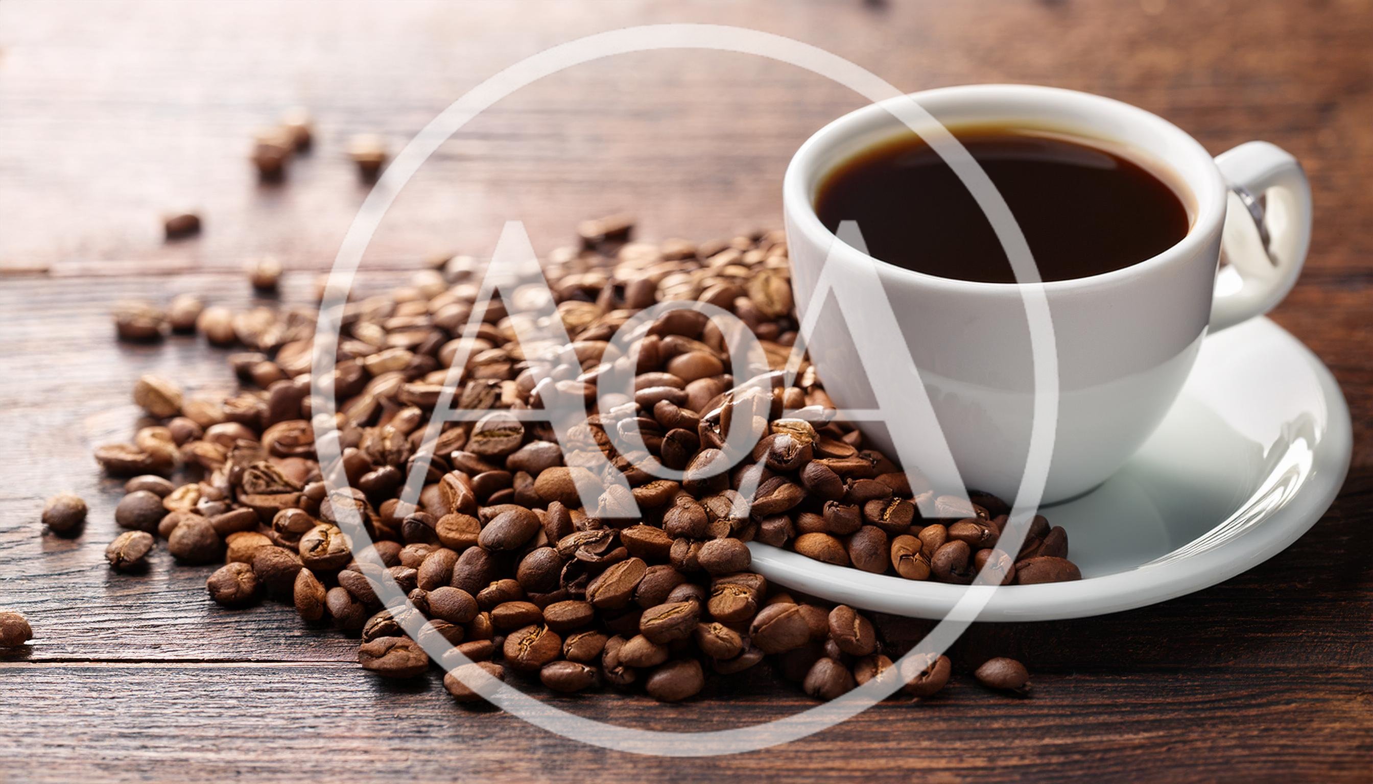 White Cup Of Black Coffee With Roasted Coffee Beans