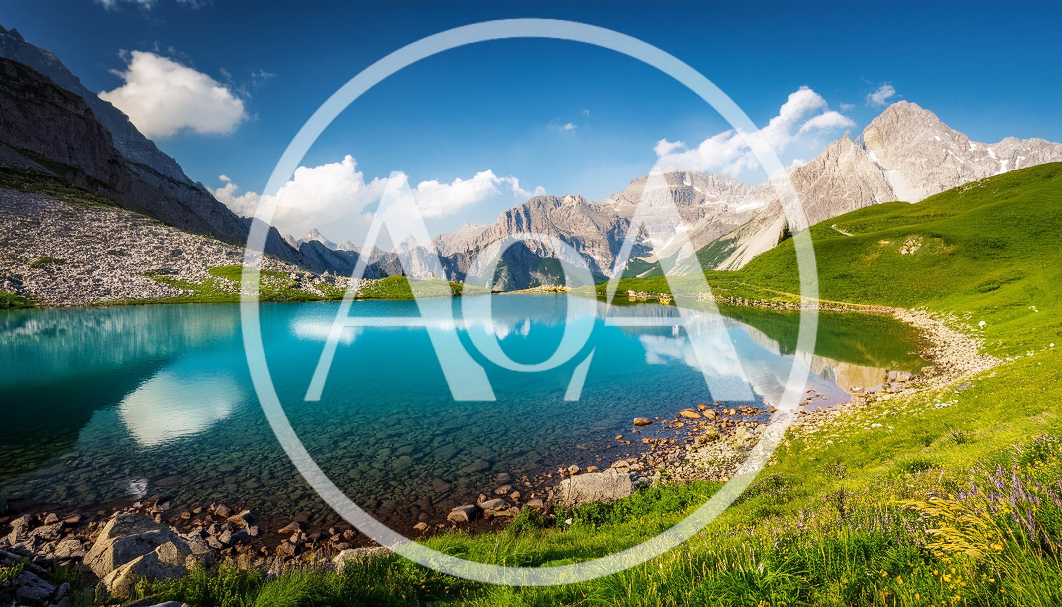 Turquoise Alpine Lake Surrounded By Rugged Mountain Peaks