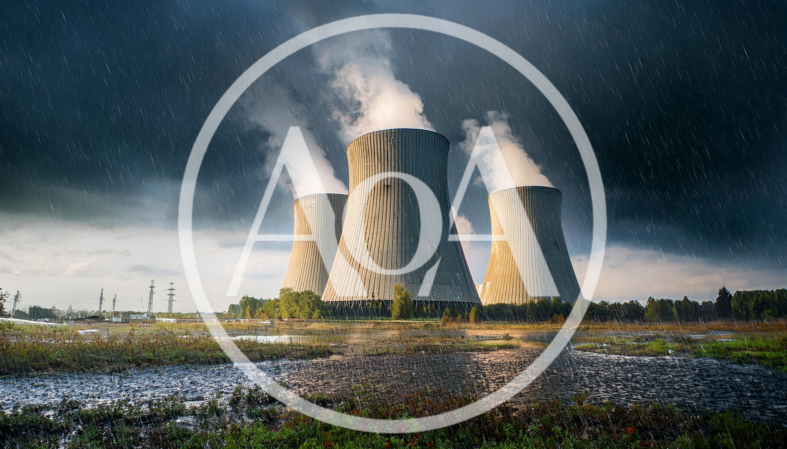 Three Nuclear Power Plant Cooling Towers Under Stormy Skies