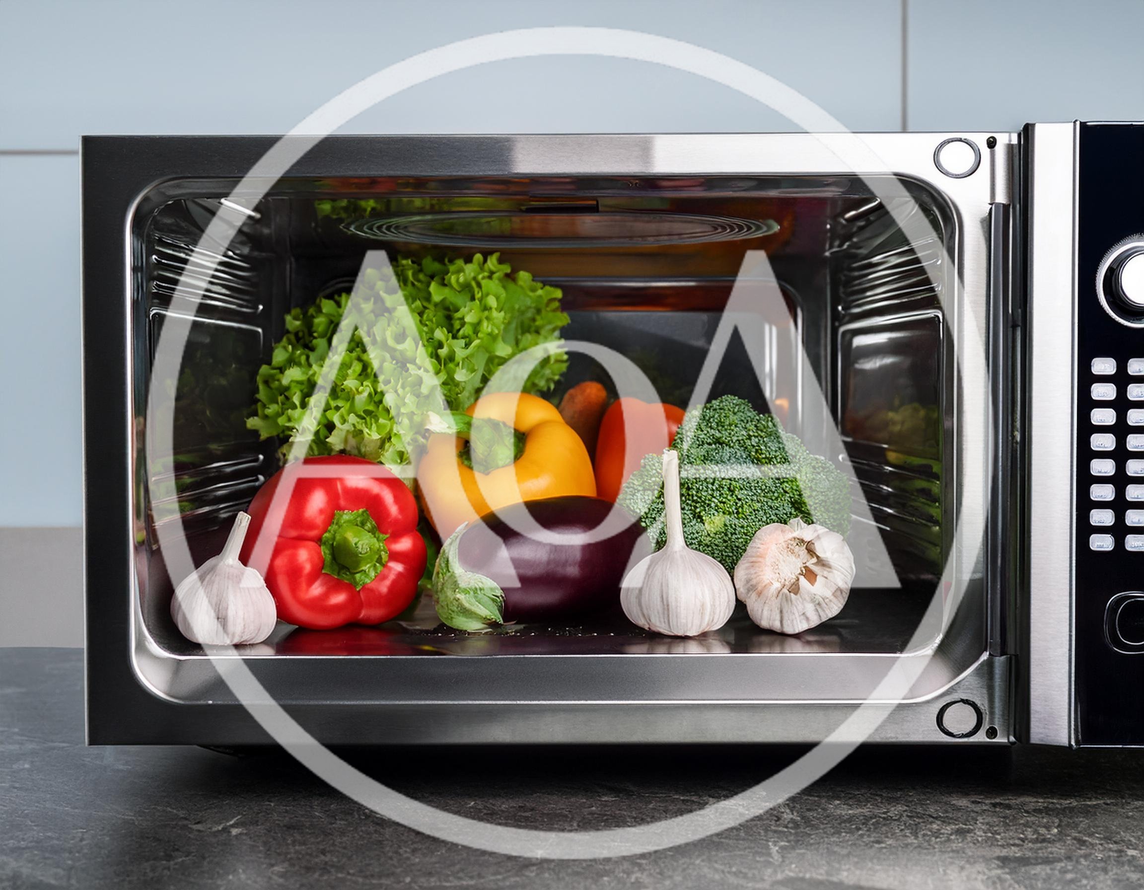 Fresh Vegetables Inside A Stainless Steel Microwave Oven