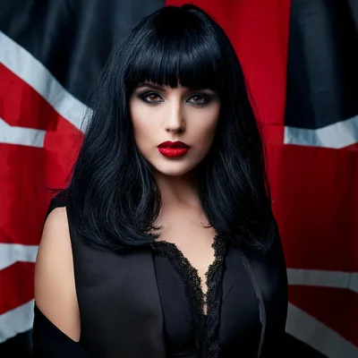 Portrait Of A Woman With Black Hair And Red Lips
