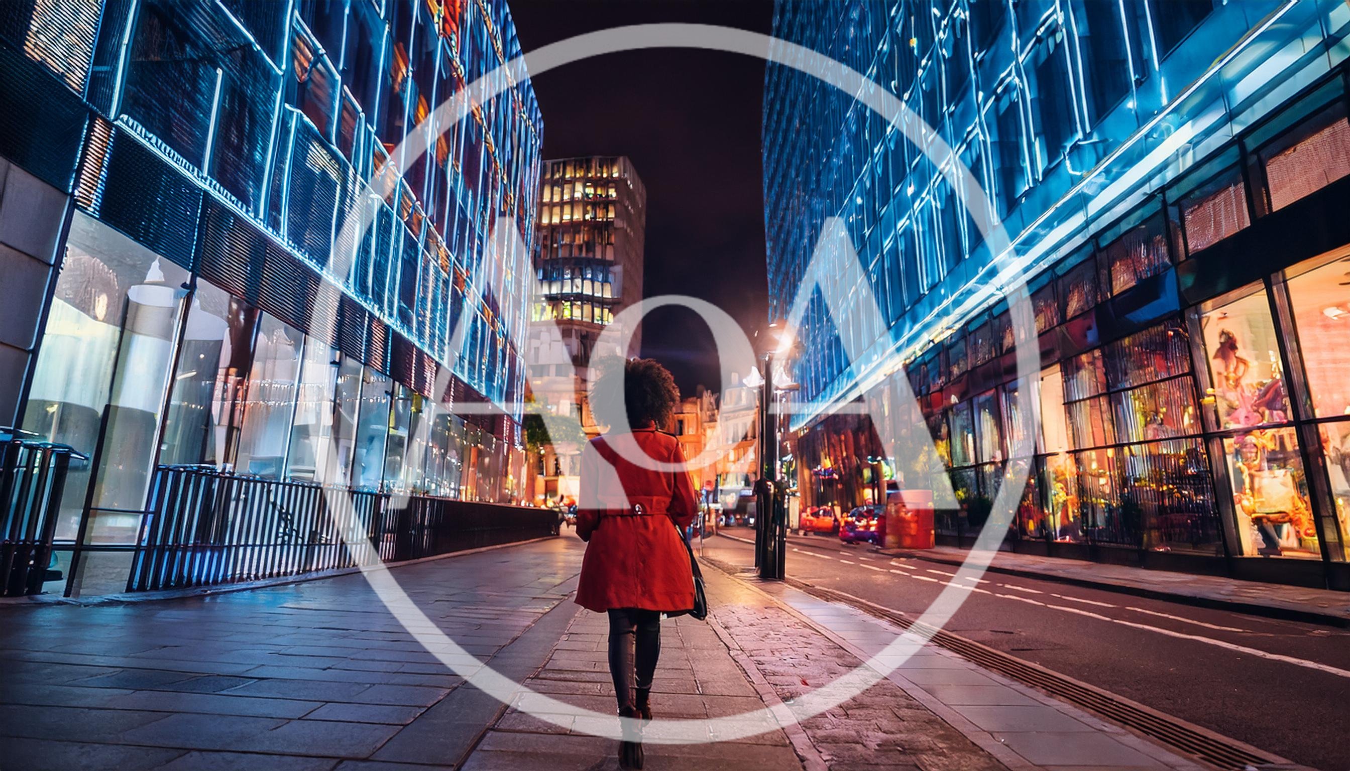 Woman In Red Coat Walking Through Modern City Street