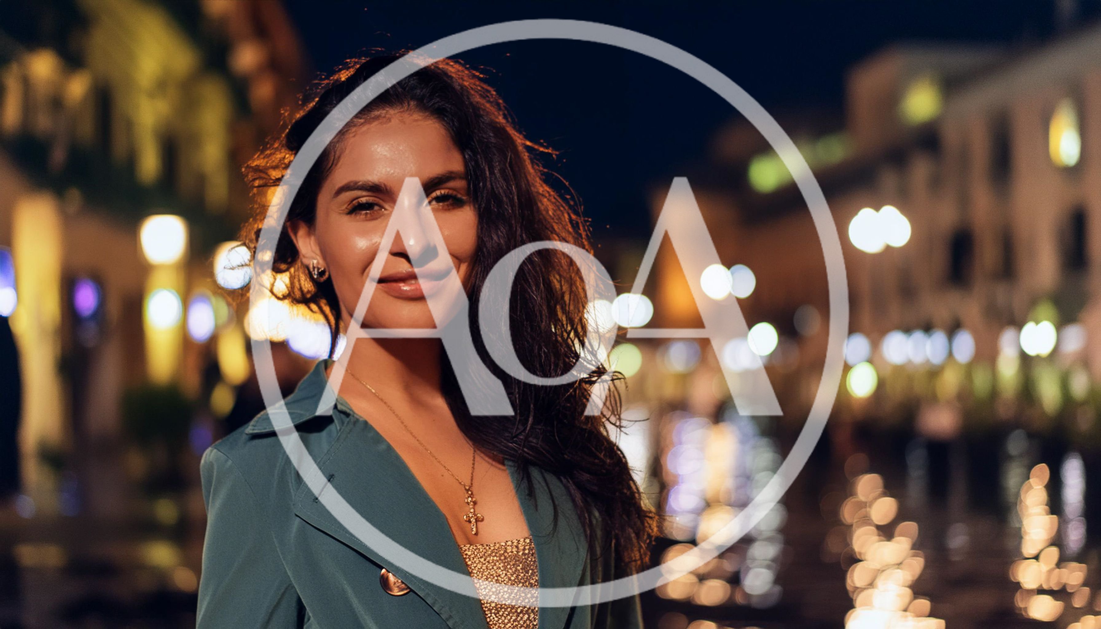 Young Woman Smiling Outdoors at Night