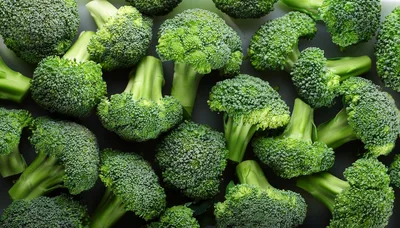 Fresh Green Broccoli Florets Arranged On Dark Background