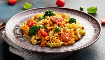 Fusilli Pasta Dish With Vegetables In A Bowl