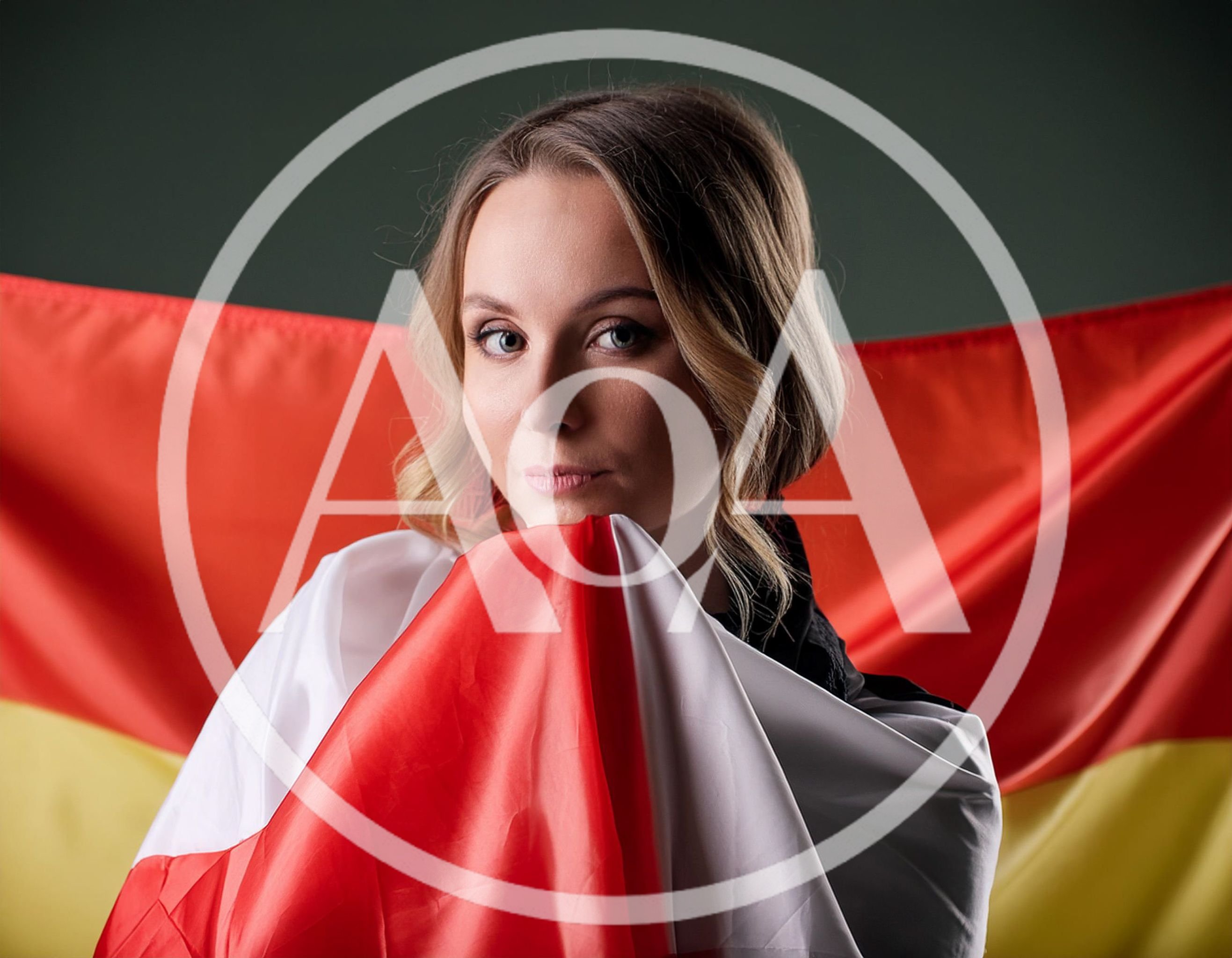 Young Woman Wrapped In A German Flag