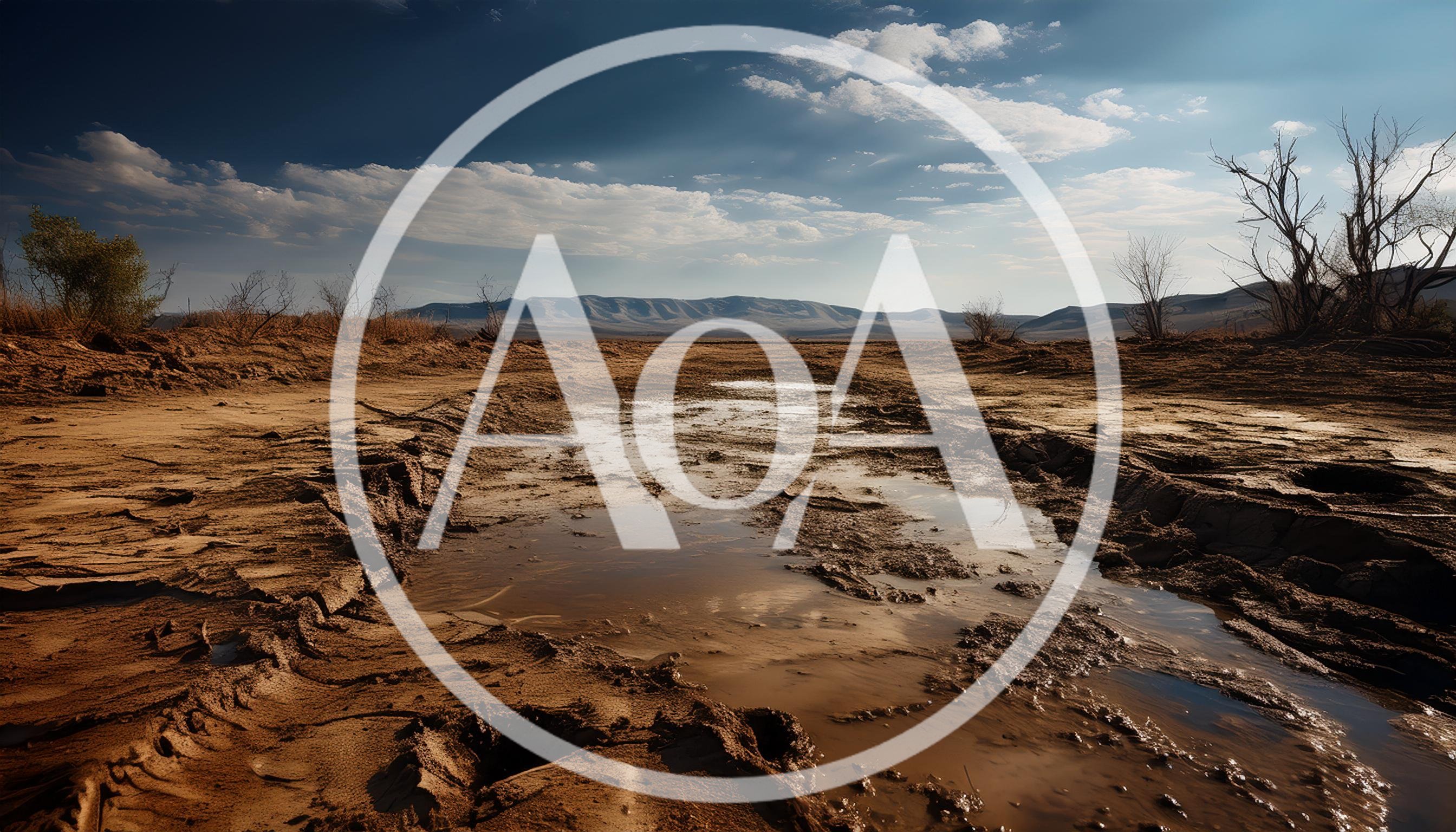 Muddy Tire Tracks Through Arid Desert Landscape