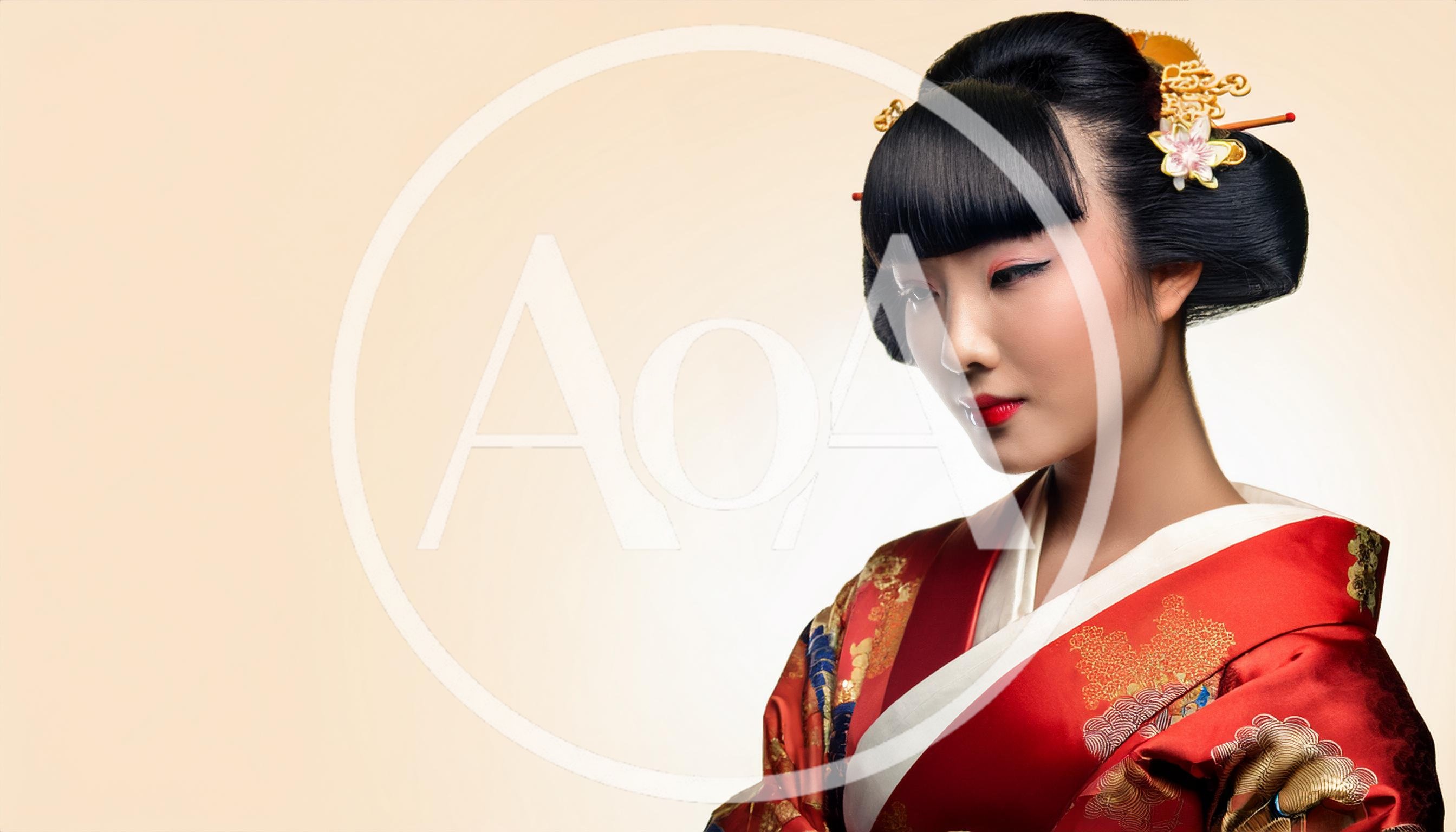 Portrait Of A Young Japanese Woman In Traditional Kimono