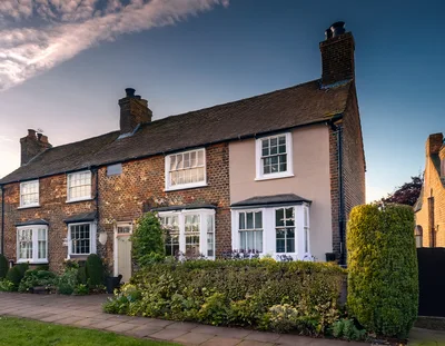 Charming English Brick Cottage With Bay Windows