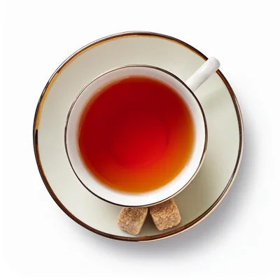 Top View Of A Cup Of Tea With Sugar Cubes