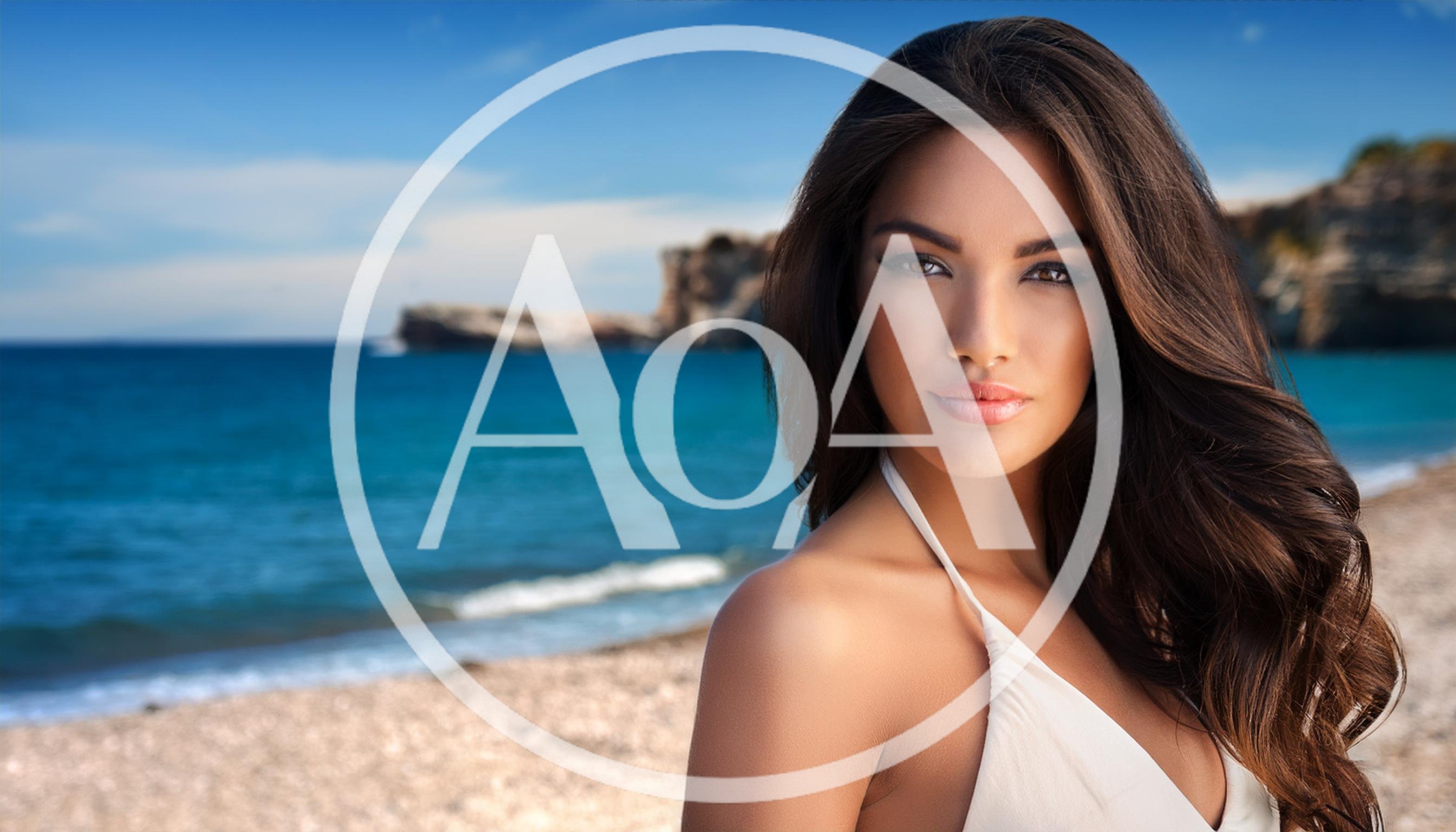 Portrait Of A Beautiful Woman On A Sunny Beach