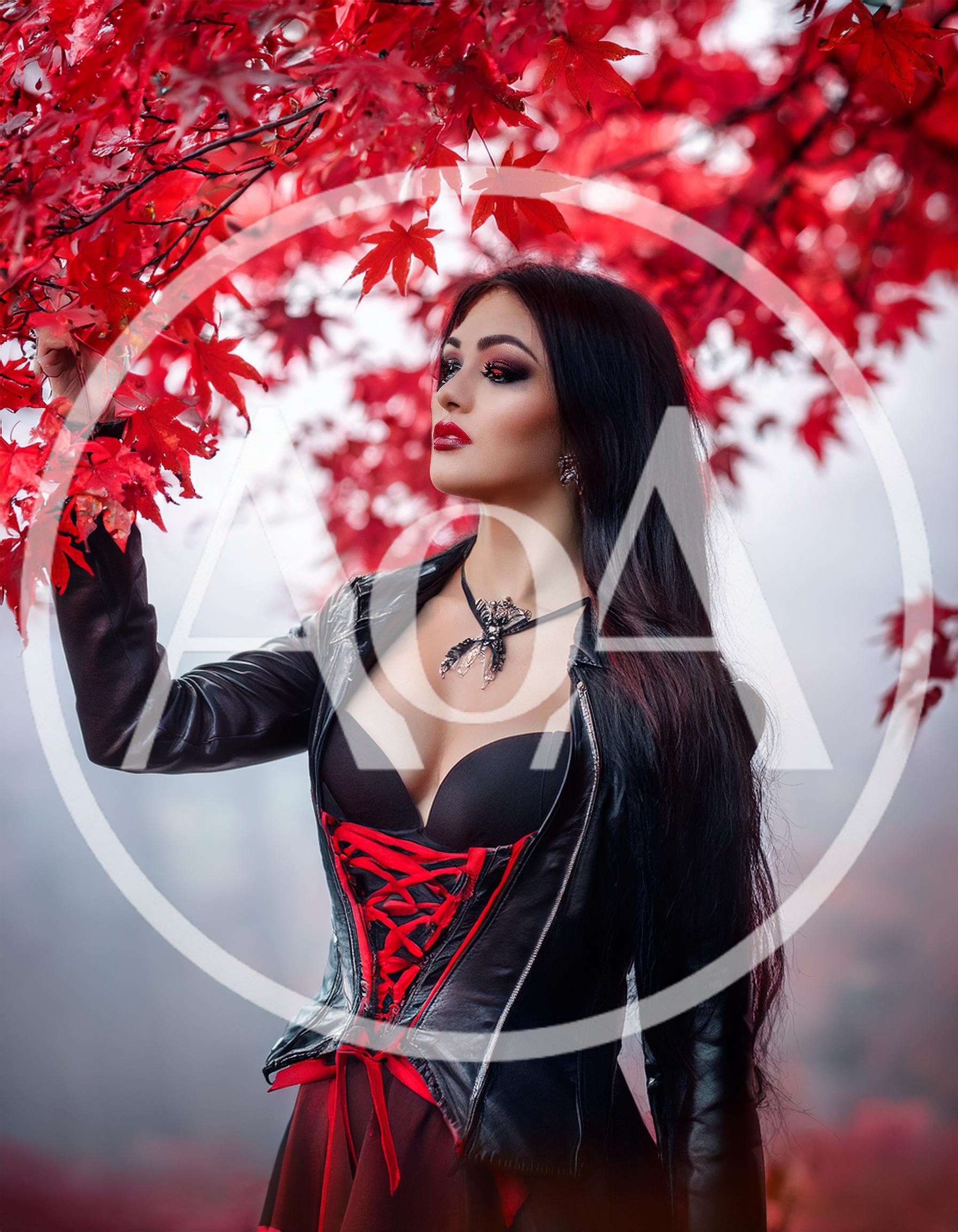 Gothic Woman Posing Under Vibrant Red Maple Leaves