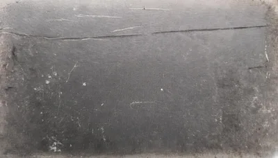 Distressed Dark Gray Textured Leather Surface Background