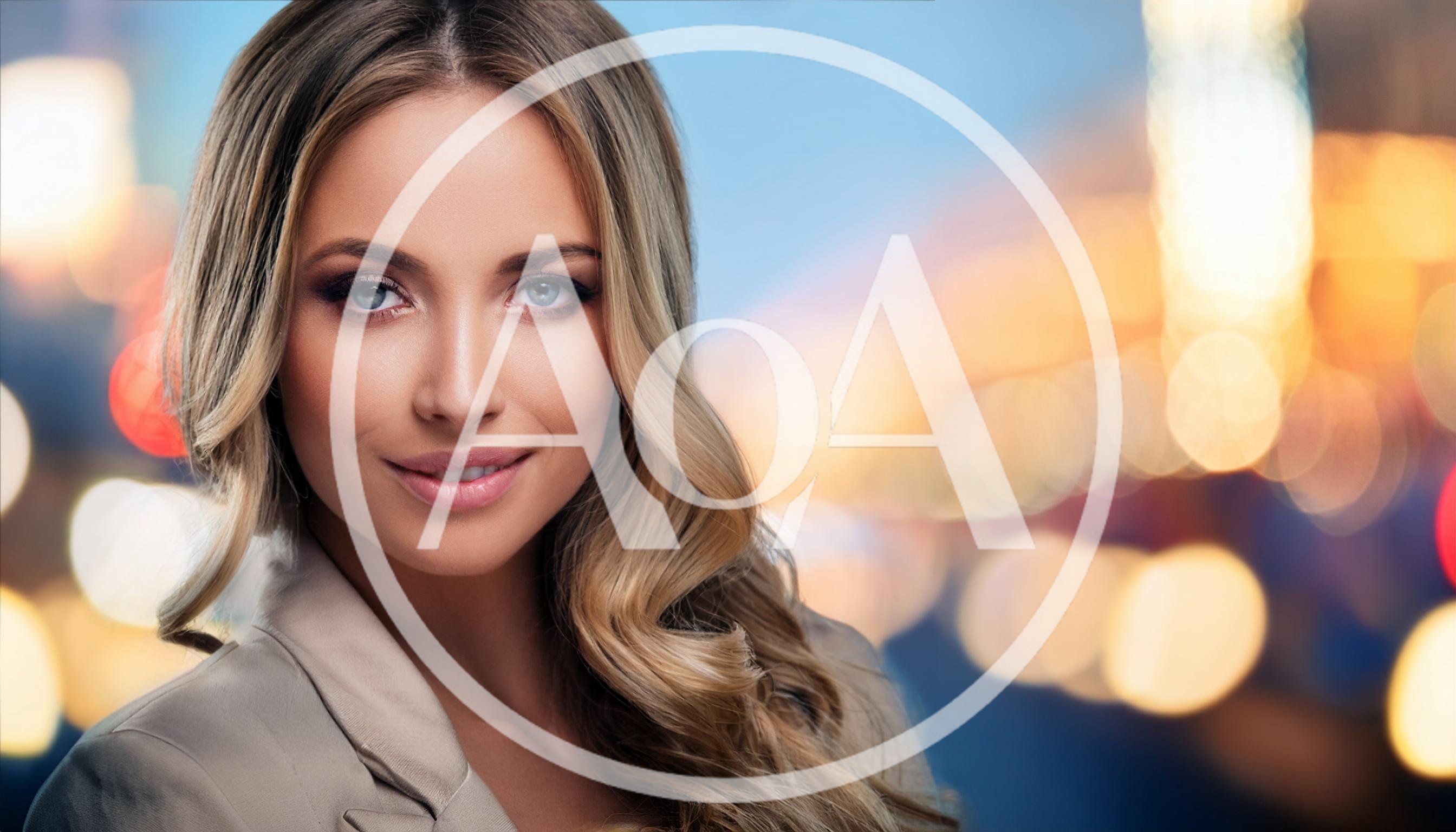 Portrait Of A Beautiful Blonde Woman With Blue Eyes