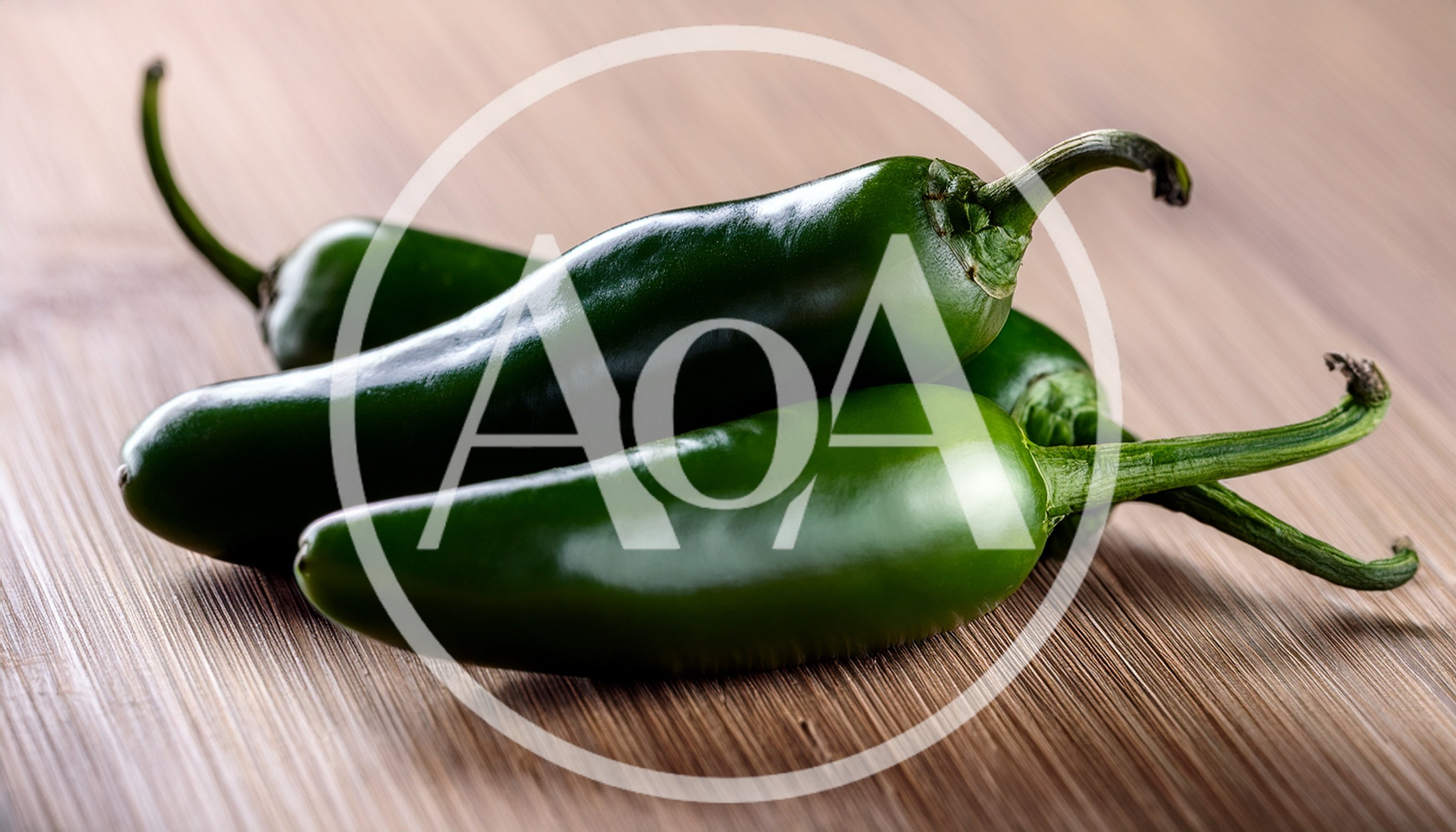 Fresh Green Jalapeno Peppers On Wooden Cutting Board