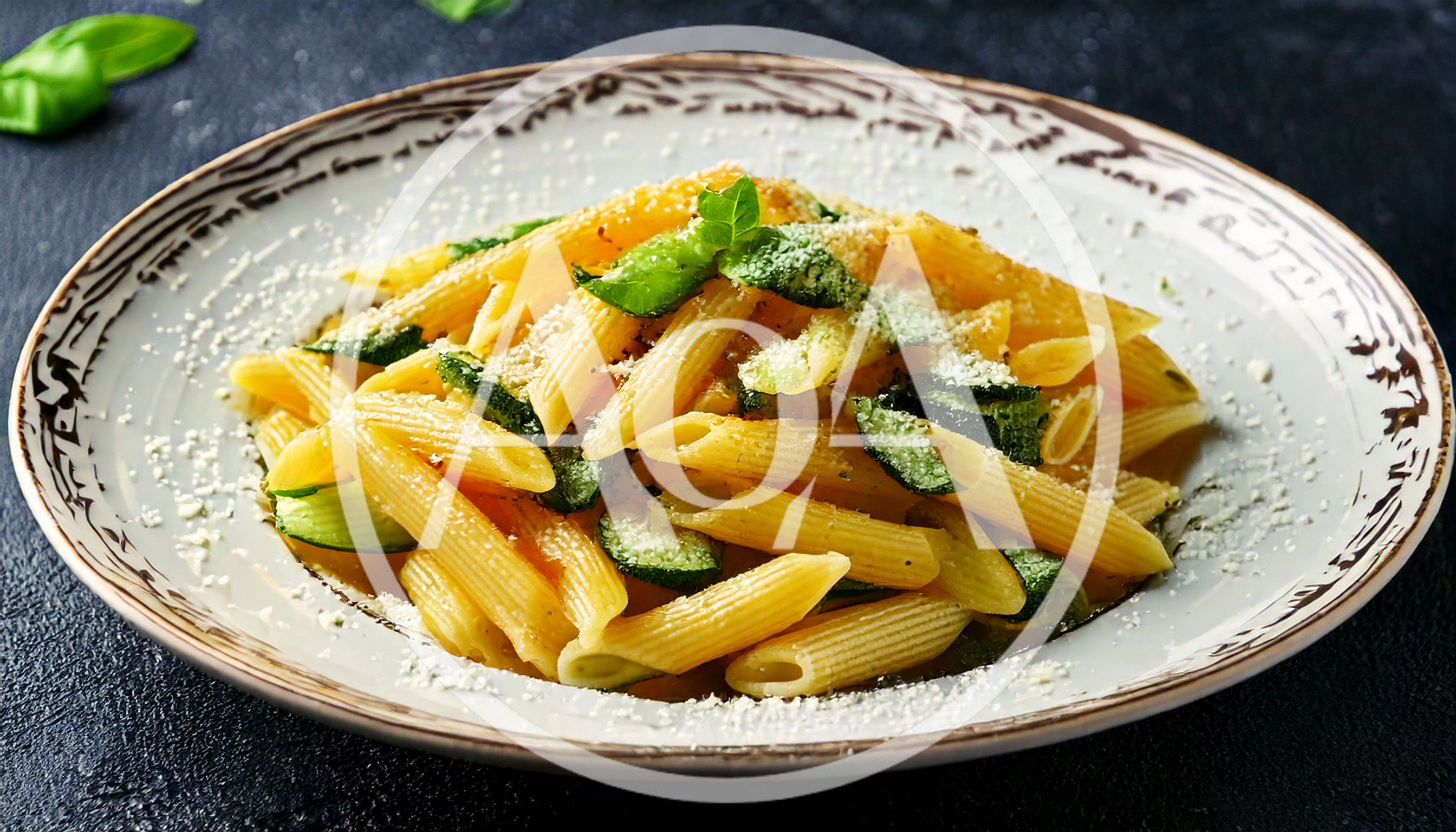 Penne Pasta With Zucchini And Parmesan Cheese