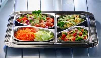 Stainless Steel Tray With Four Fresh Vegetable Salads