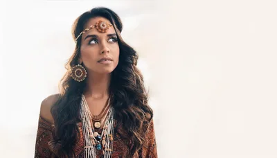 Bohemian Woman With Long Wavy Hair Looking Up