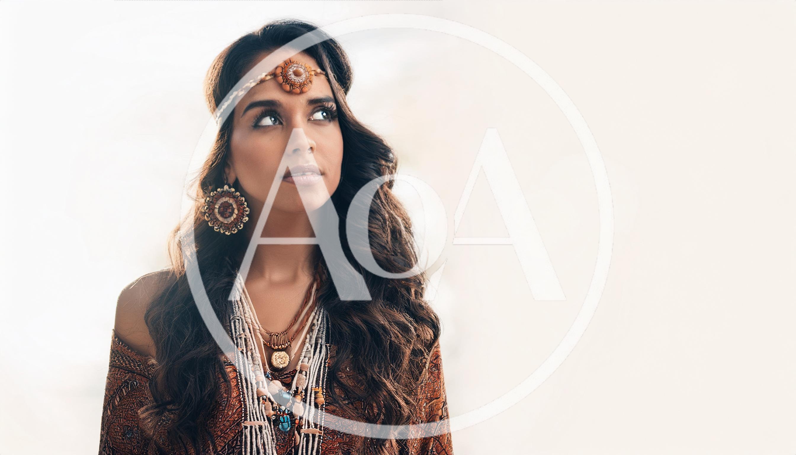 Bohemian Woman With Long Wavy Hair Looking Up
