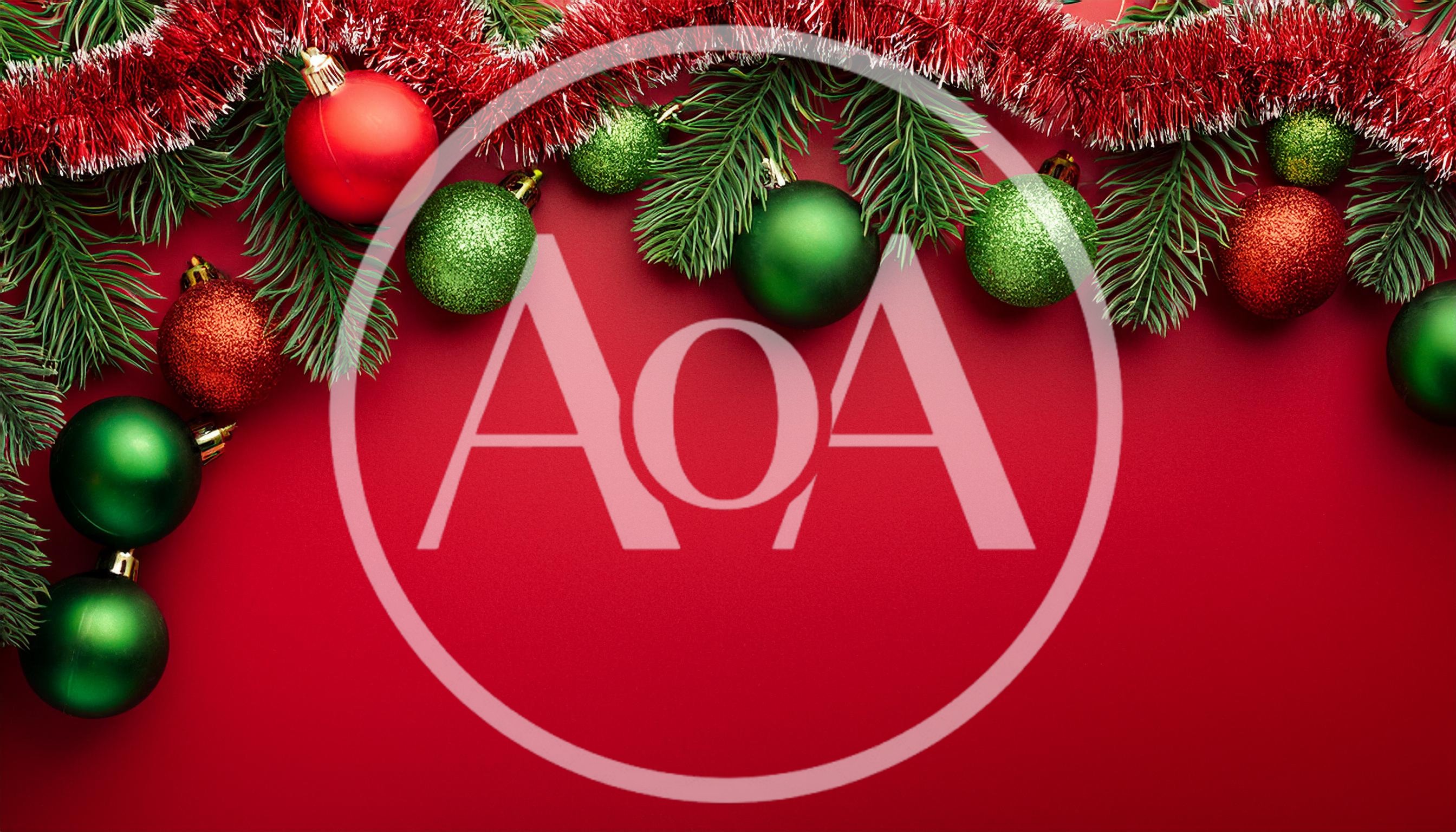 Christmas Ornaments and Pine Branches on Red Background