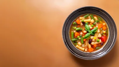 Bowl Of Minestrone Soup With Fresh Basil Garnish