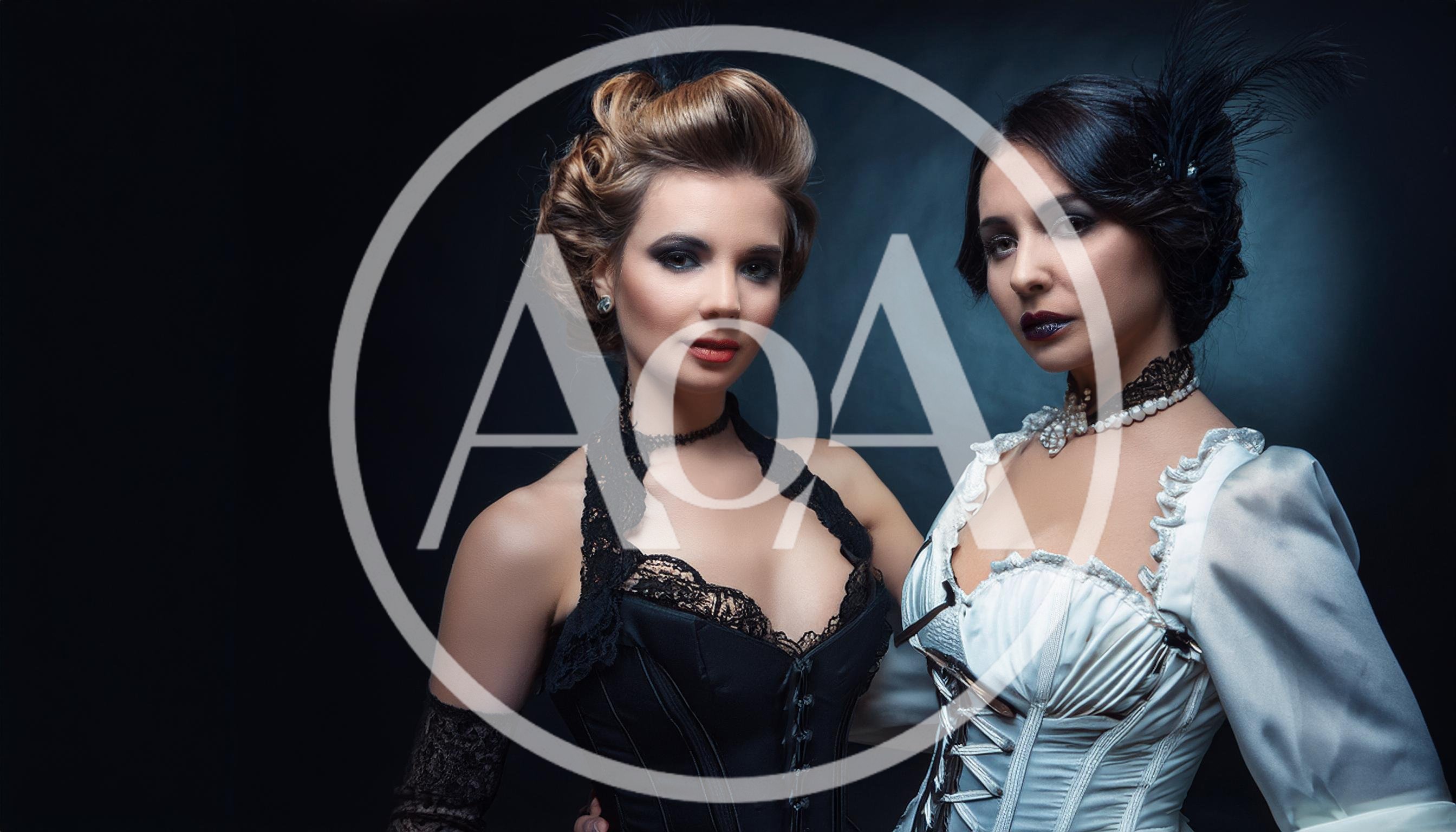 Two Elegant Women In Victorian Style Corsets