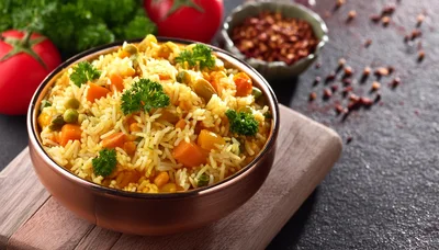 Bowl Of Vegetable Biryani With Fresh Herbs