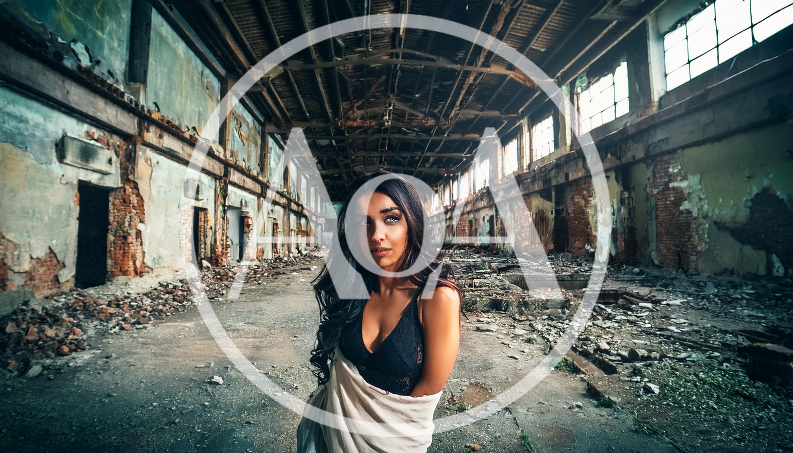 Young Woman Posing In An Abandoned Industrial Warehouse