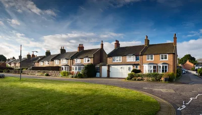 Row Of Traditional English Brick Houses In Suburbia