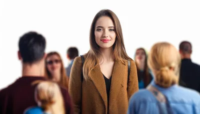 Young Woman Standing Out In A Crowd