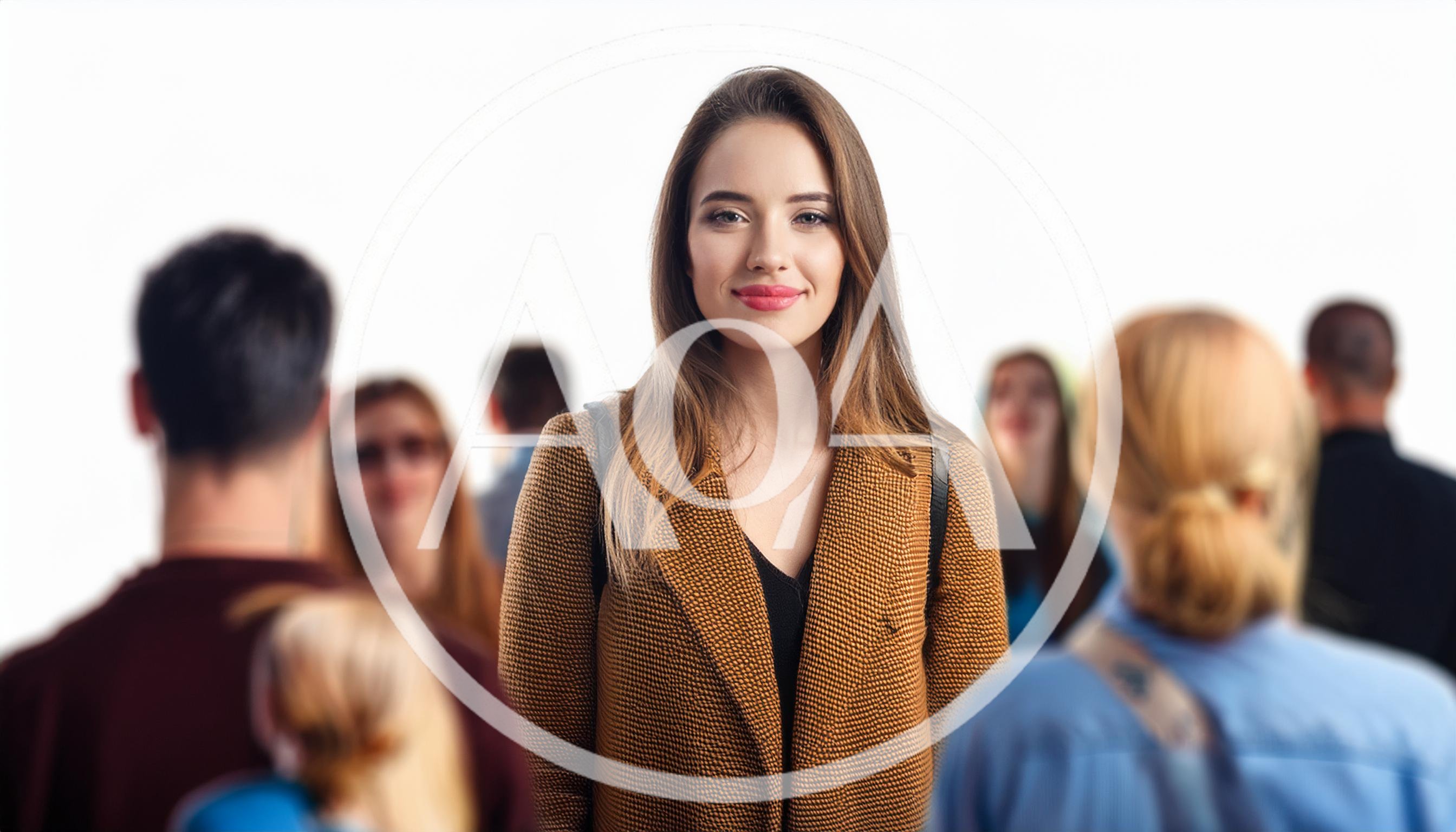 Young Woman Standing Out In A Crowd