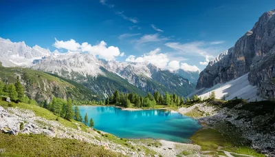 Turquoise Alpine Lake Surrounded By Dolomite Mountains