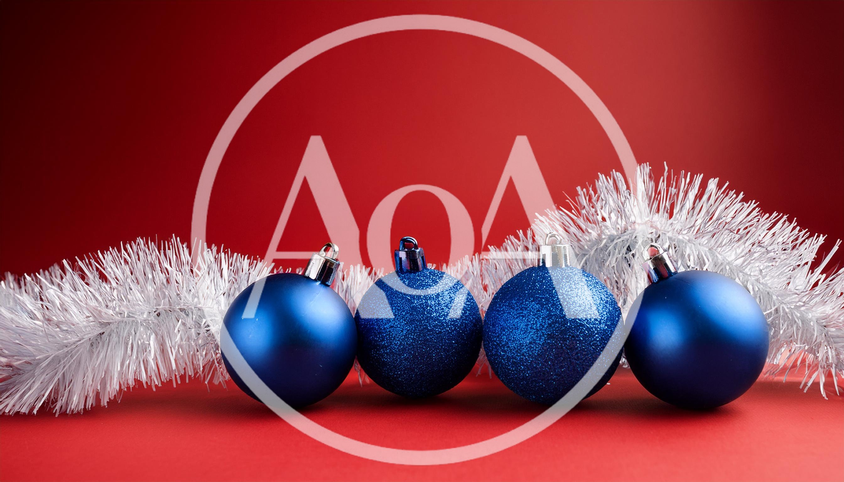 Four Blue Christmas Ornaments With Silver Tinsel