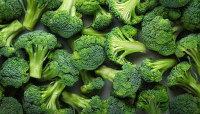 Fresh Green Broccoli Florets Arranged On A Surface