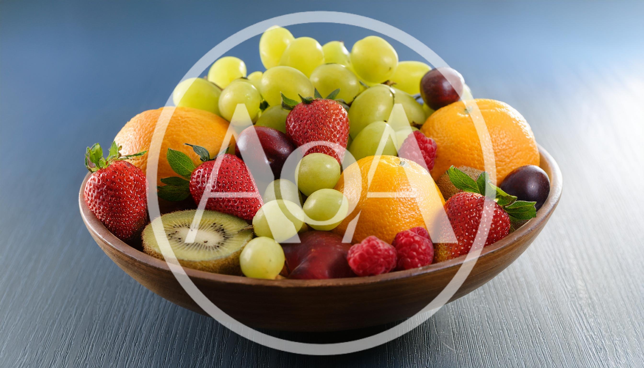 Fresh Assorted Fruits in a Wooden Bowl