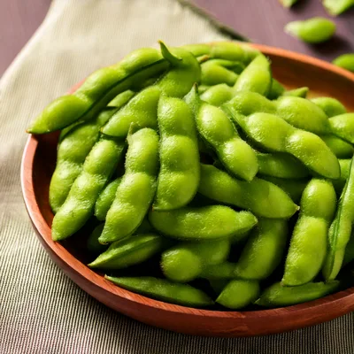 Fresh Edamame Soybeans Served In A Wooden Bowl