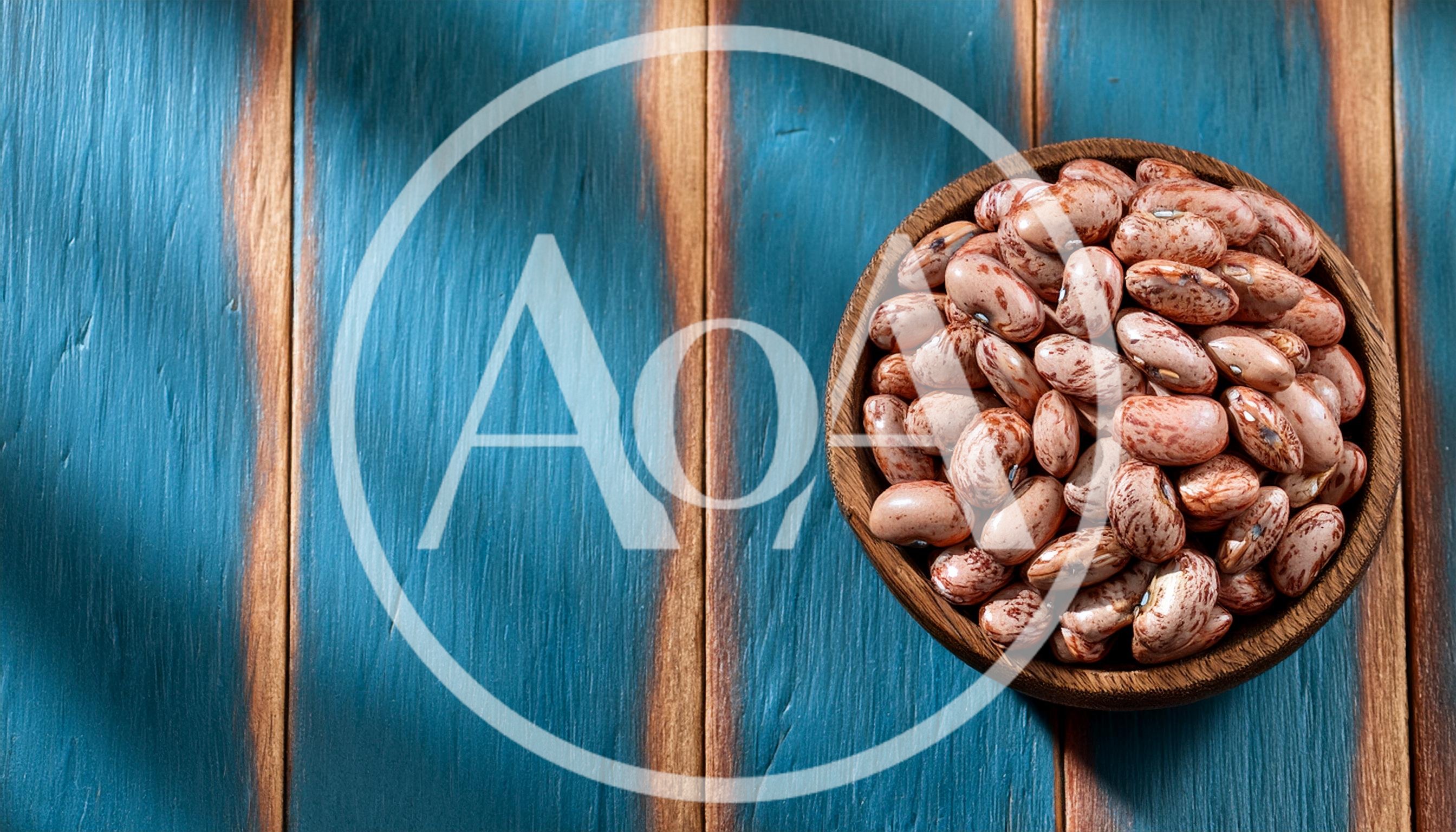 Pinto Beans In A Wooden Bowl On Blue Wood