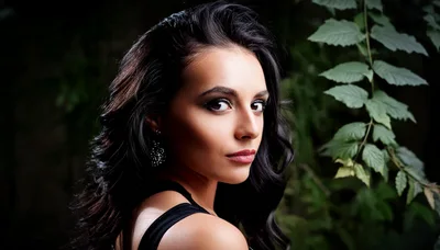 Portrait Of A Beautiful Woman With Dark Wavy Hair