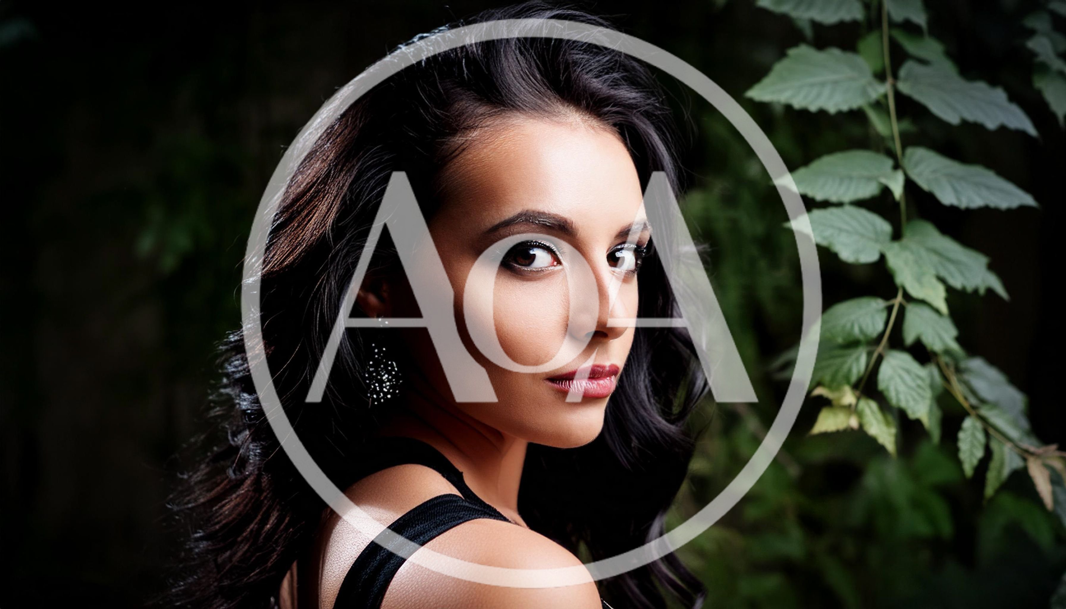 Portrait Of A Beautiful Woman With Dark Wavy Hair
