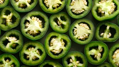 Fresh Sliced Jalapeno Pepper Rings Background