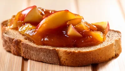 Slice Of Bread Topped With Apple Jam